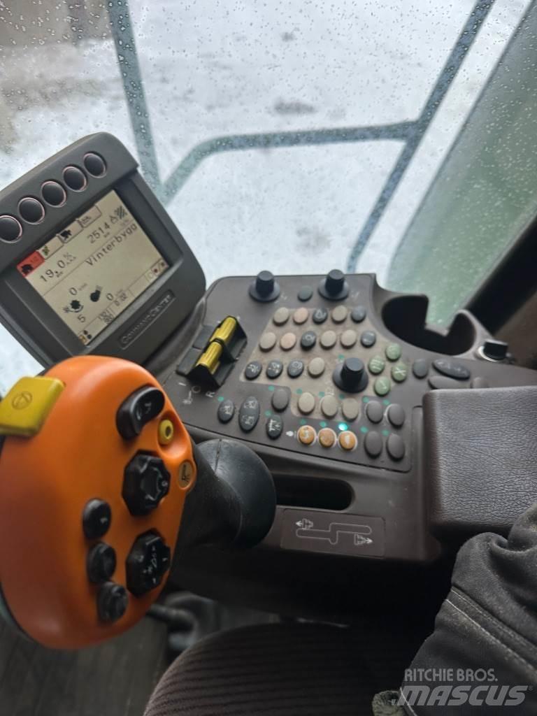 John Deere T550 Зернозбиральні комбайни