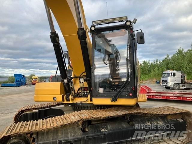 CAT 330 Гусеничні екскаватори