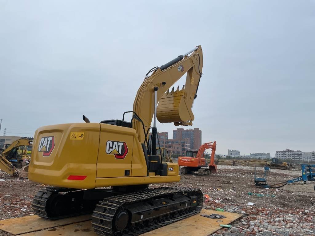 CAT 323GC Гусеничні екскаватори
