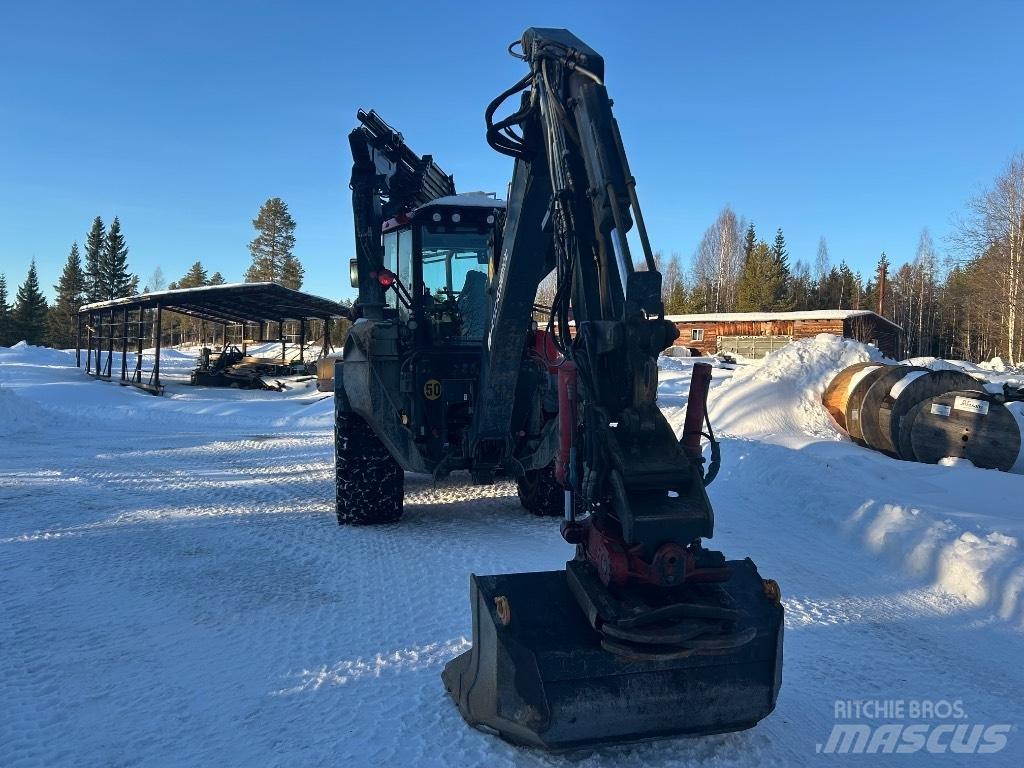 Huddig 1260 C Екскаватори-навантажувачі