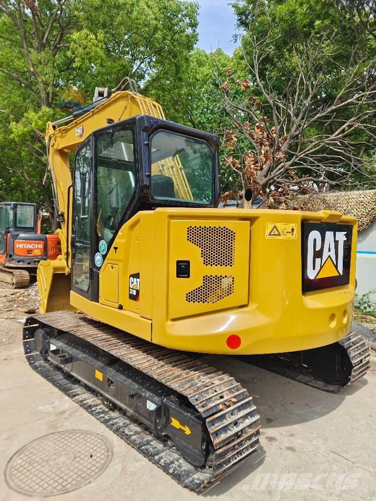 CAT 310 Гусеничні екскаватори
