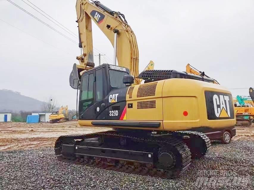 CAT 329D Середні екскаватори 7т. - 12т.