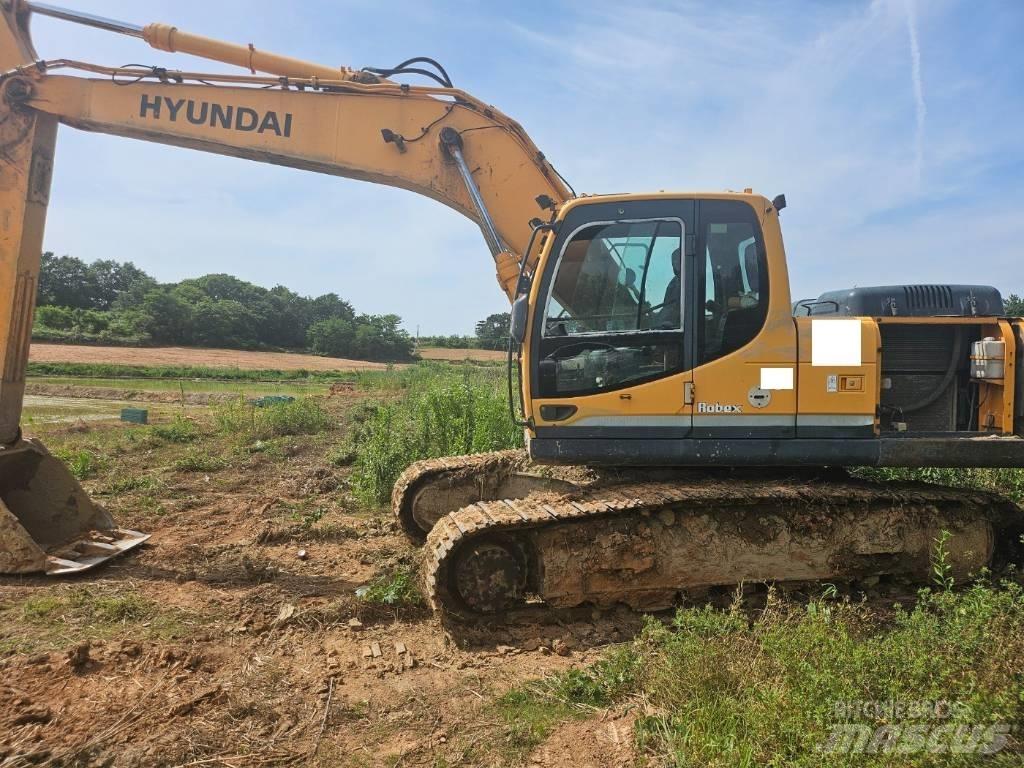 Hyundai Robex 220 LC Гусеничні екскаватори