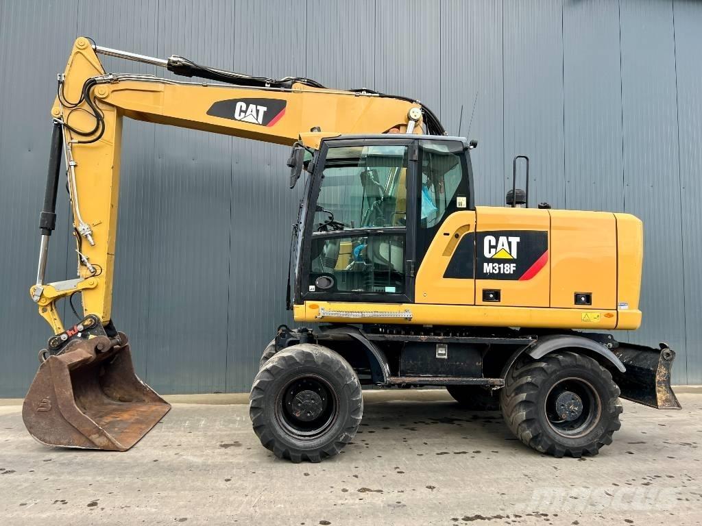 CAT M318F Колісні екскаватори