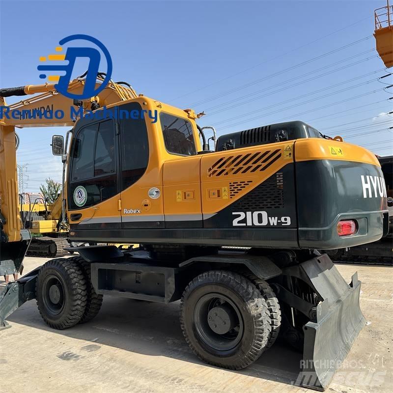 Hyundai 210W-9 Колісні екскаватори