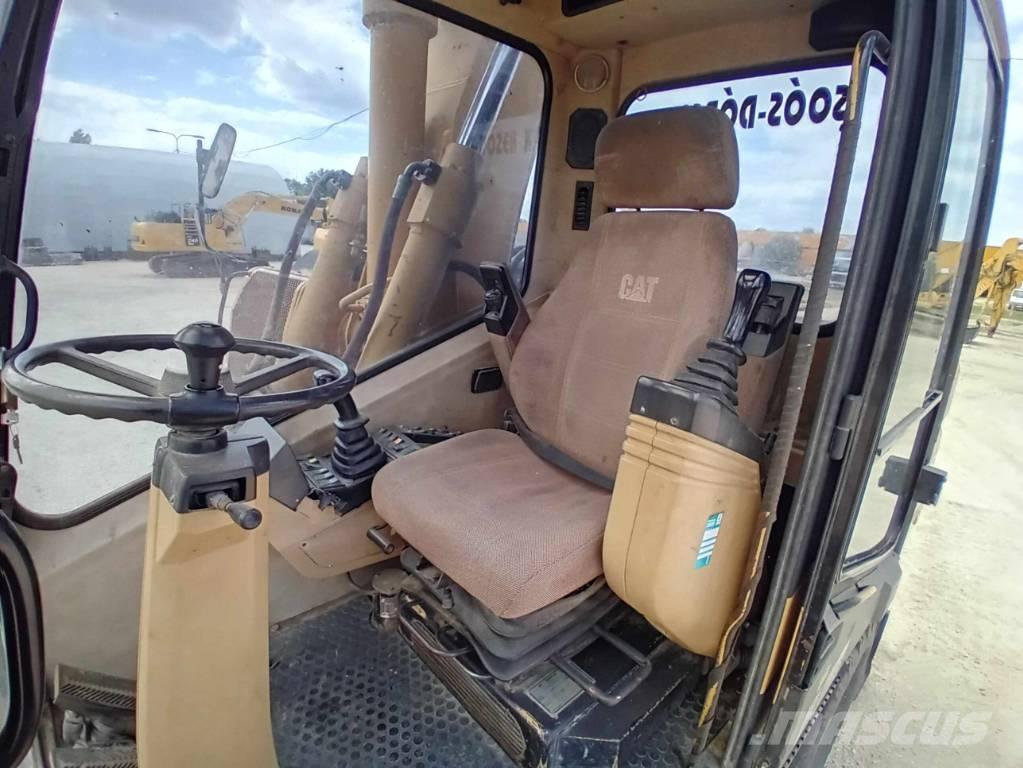 CAT M 315 Колісні екскаватори