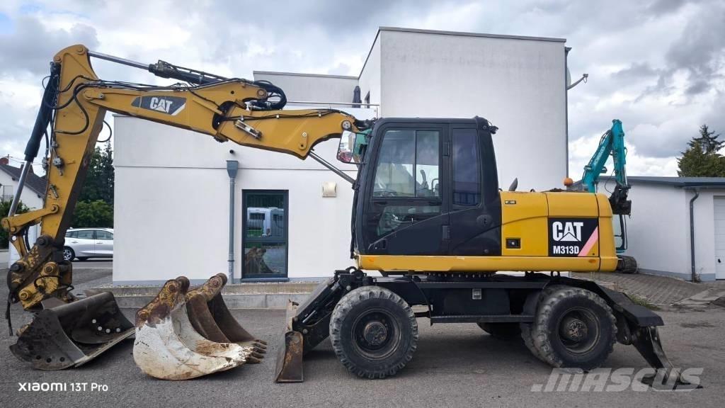 CAT M 313 D Колісні екскаватори