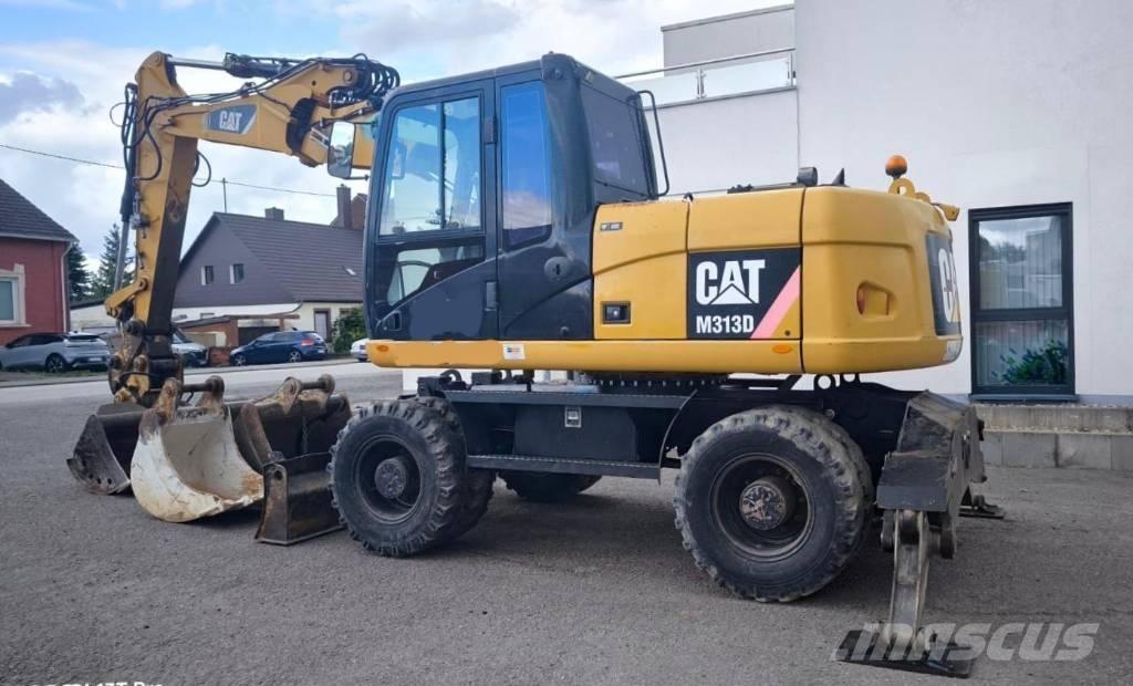CAT M 313 D Колісні екскаватори