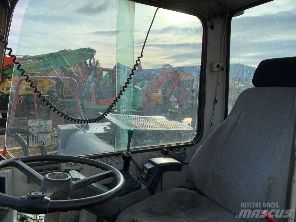 Takeuchi TB070W Колісні екскаватори