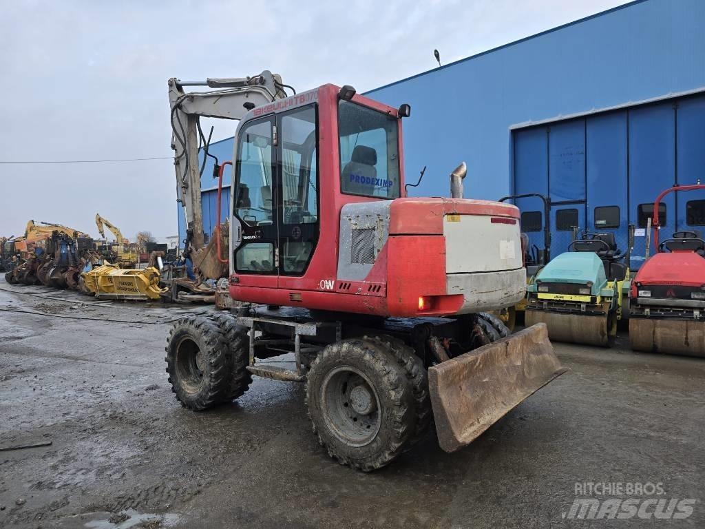 Takeuchi TB070W Колісні екскаватори