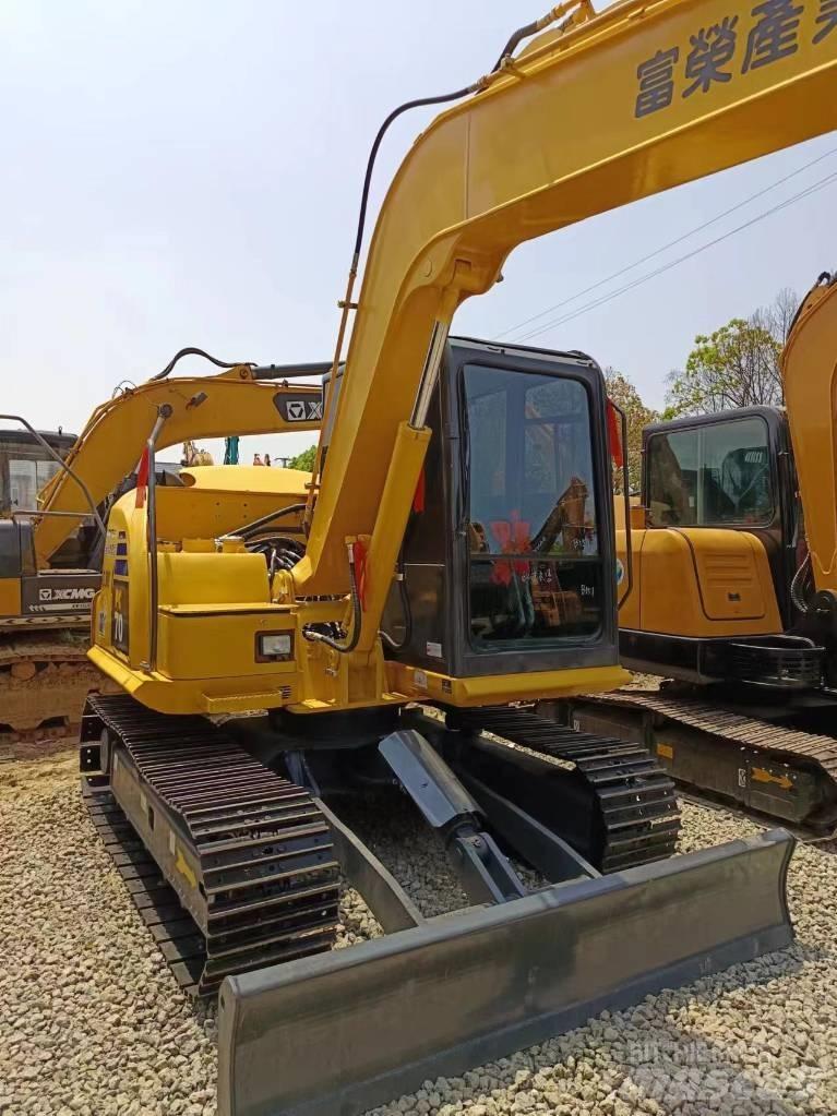 Komatsu PC 70 Середні екскаватори 7т. - 12т.