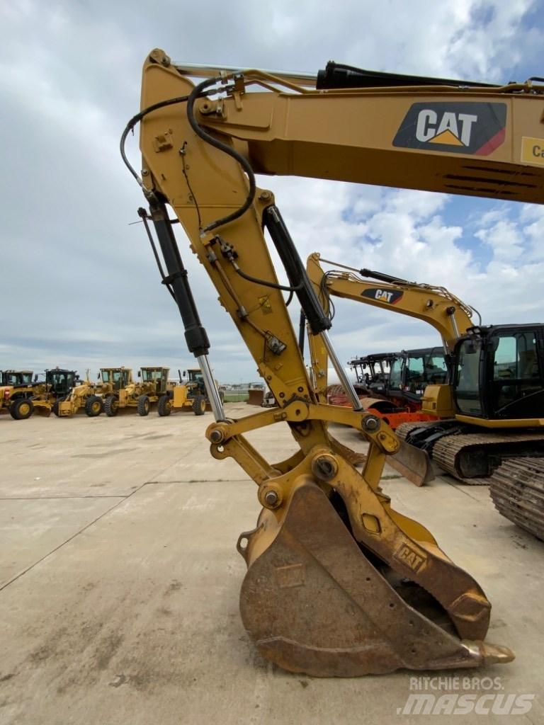 CAT 323 Гусеничні екскаватори