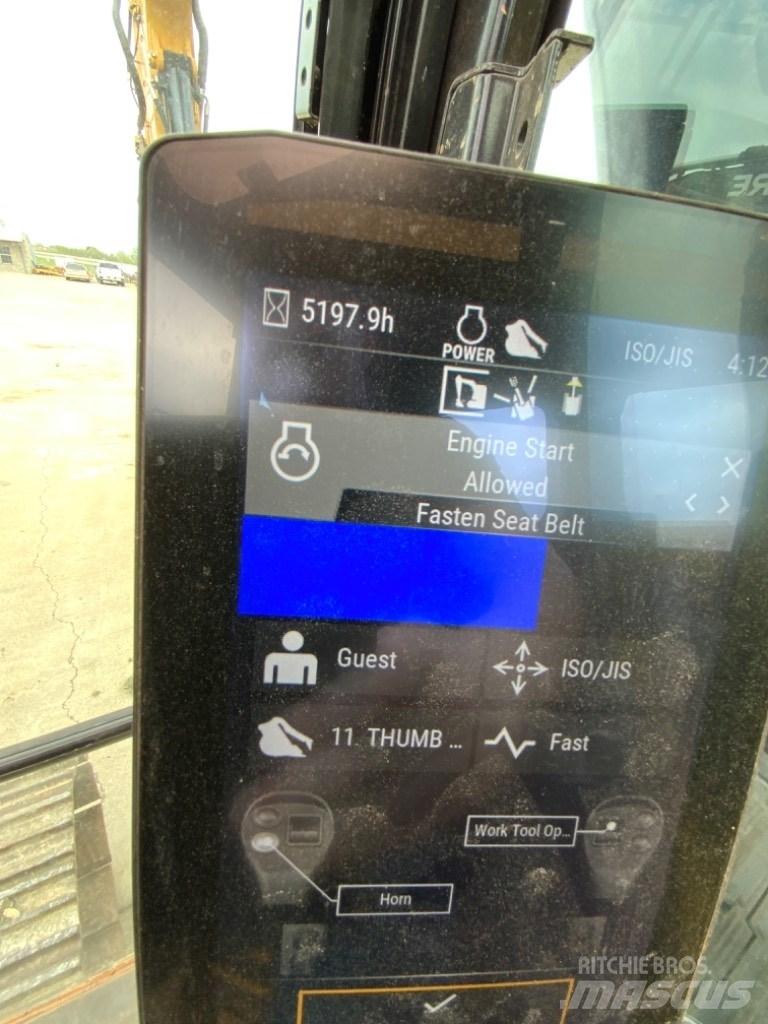 CAT 323 Гусеничні екскаватори