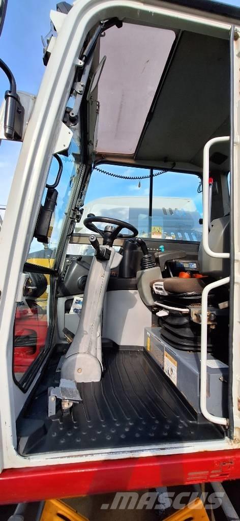 Takeuchi TB 295 W Колісні екскаватори