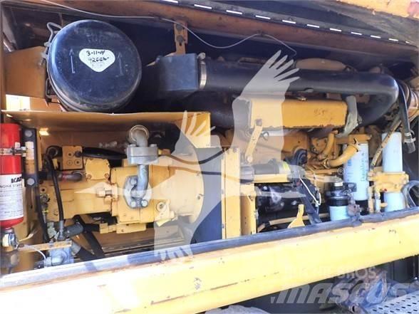 CAT M320 Колісні екскаватори