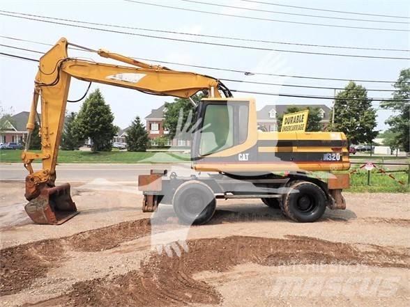 CAT M320 Колісні екскаватори