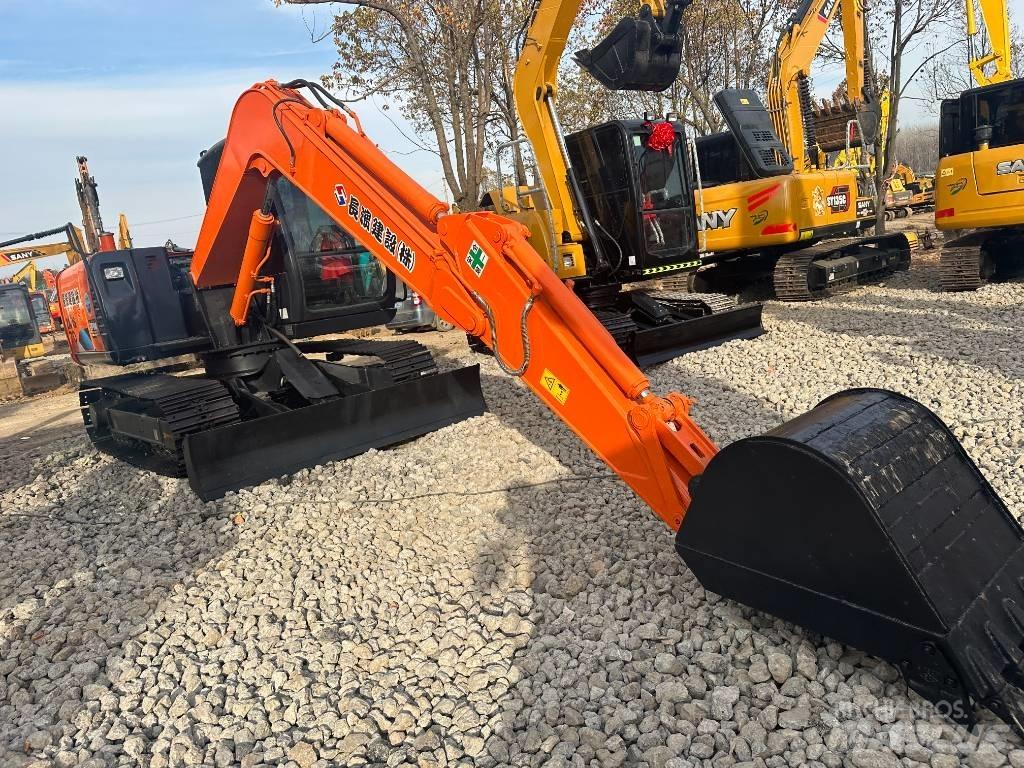 Hitachi ZX 70 Міні-екскаватори < 7т