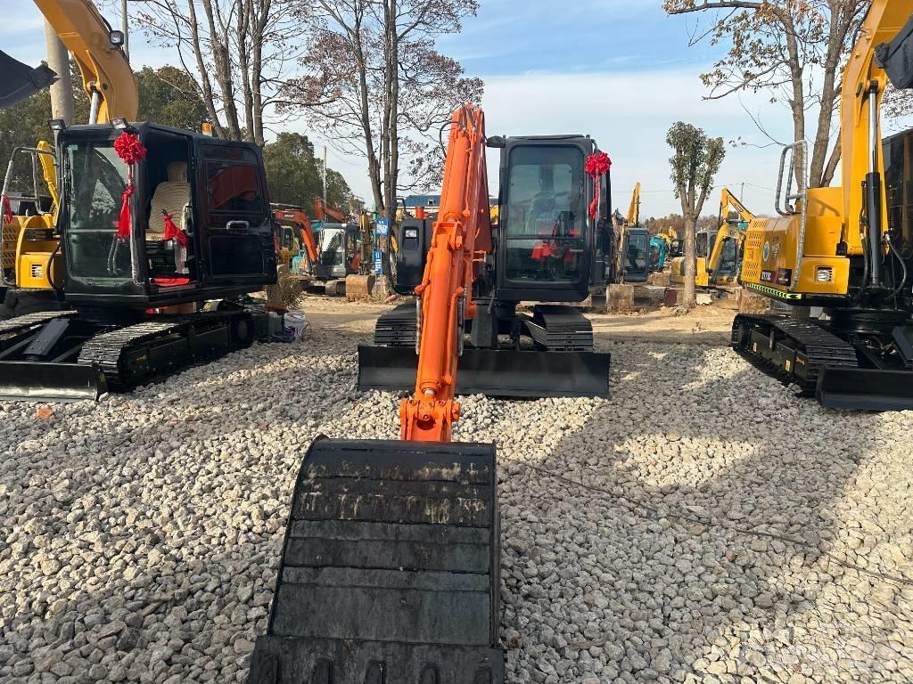 Hitachi ZX 70 Міні-екскаватори < 7т