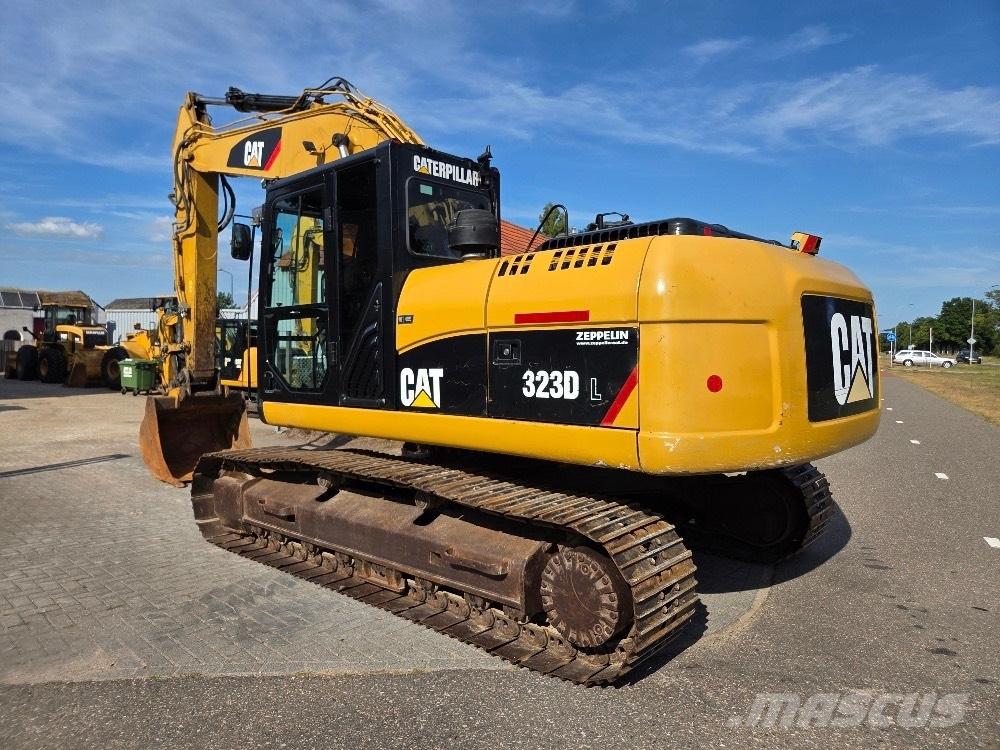 CAT 323DL Гусеничні екскаватори