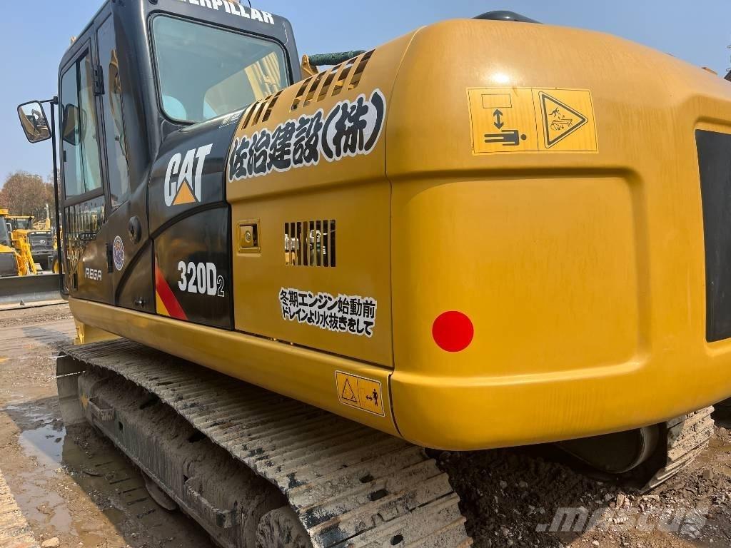 CAT 320 D Гусеничні екскаватори