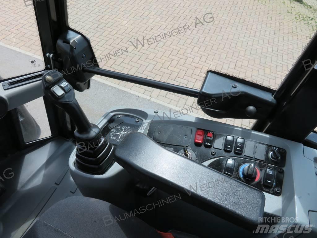 CAT 906M Фронтальні навантажувачі