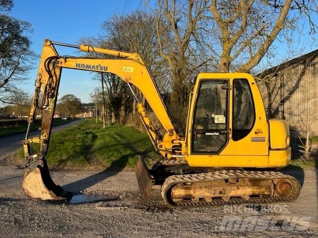 Komatsu PC 75R Середні екскаватори 7т. - 12т.