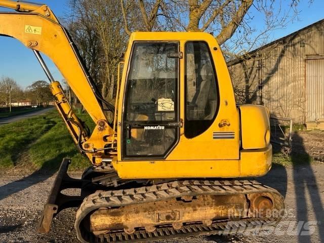 Komatsu PC 75R Середні екскаватори 7т. - 12т.