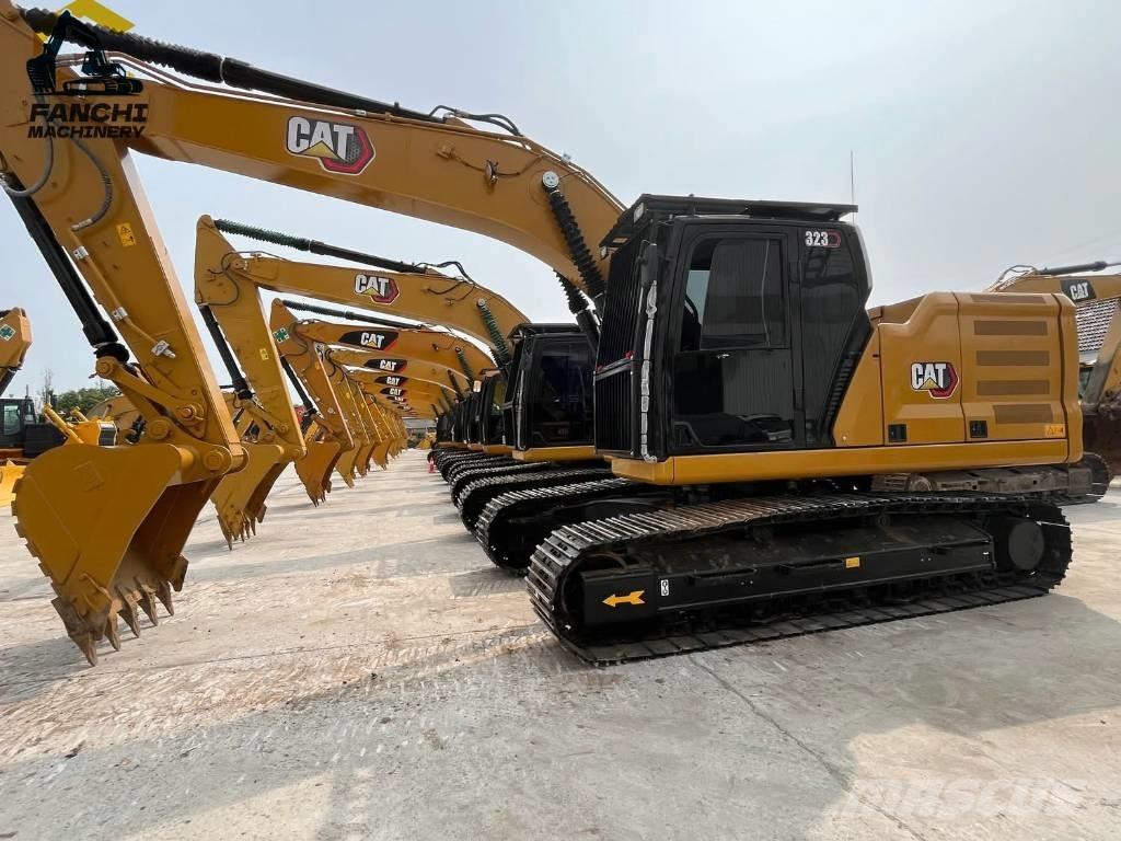 CAT 323 Гусеничні екскаватори
