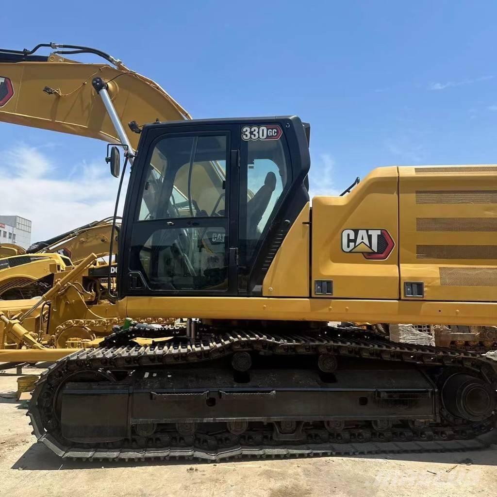 CAT 330 Гусеничні екскаватори