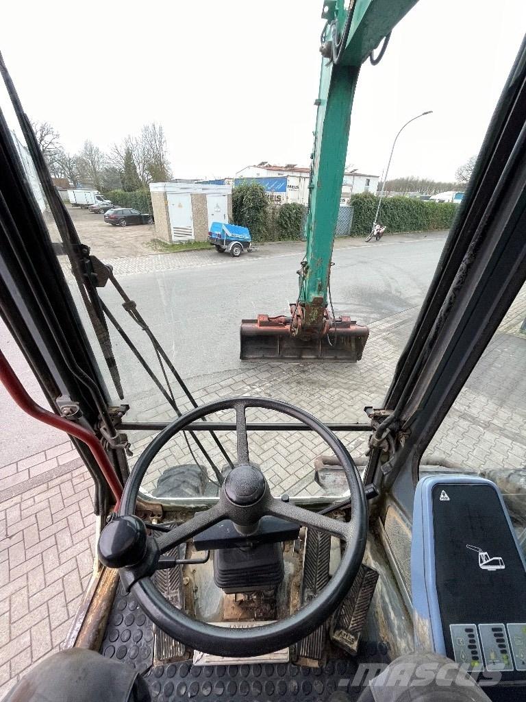 Atlas 1504 Колісні екскаватори