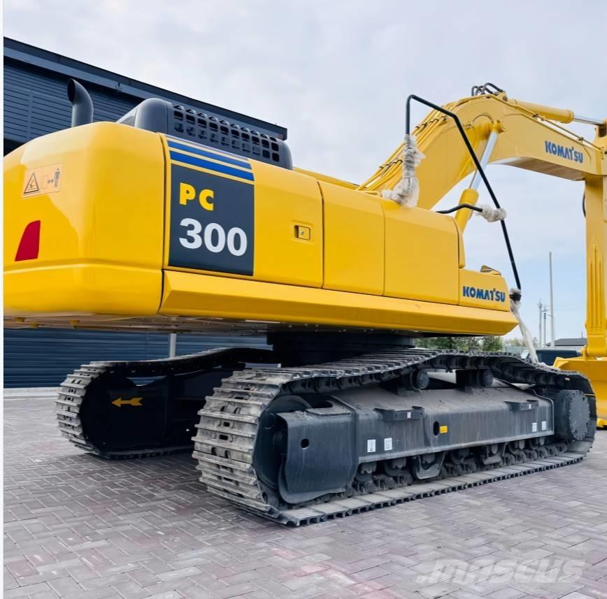 Komatsu 300 Гусеничні екскаватори