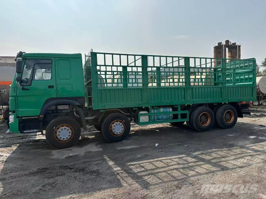 Sinotruk HOWO420hp Вантажівки-платформи/бокове розвантаження