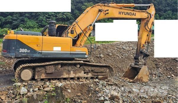 Hyundai Robex 300 LC Гусеничні екскаватори