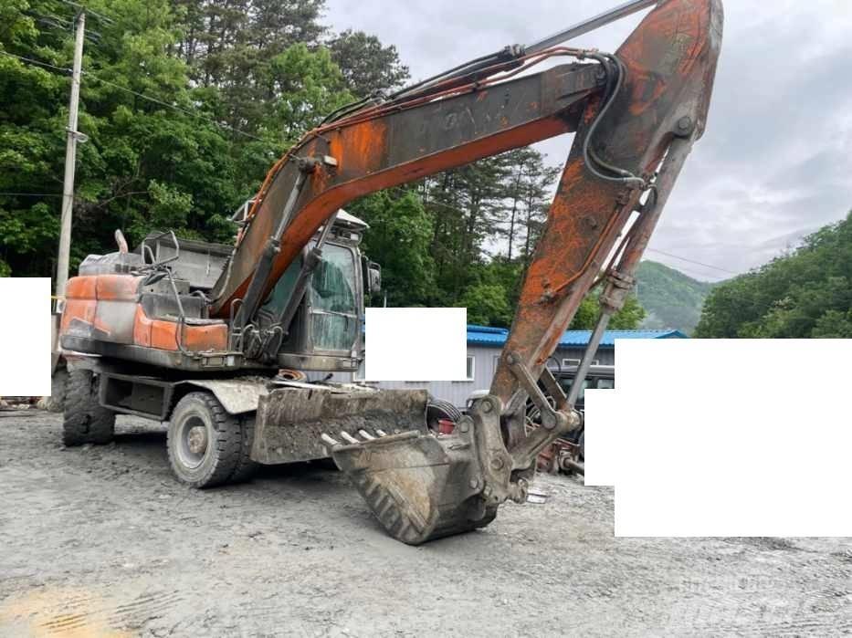 Doosan DX 210 W Колісні екскаватори