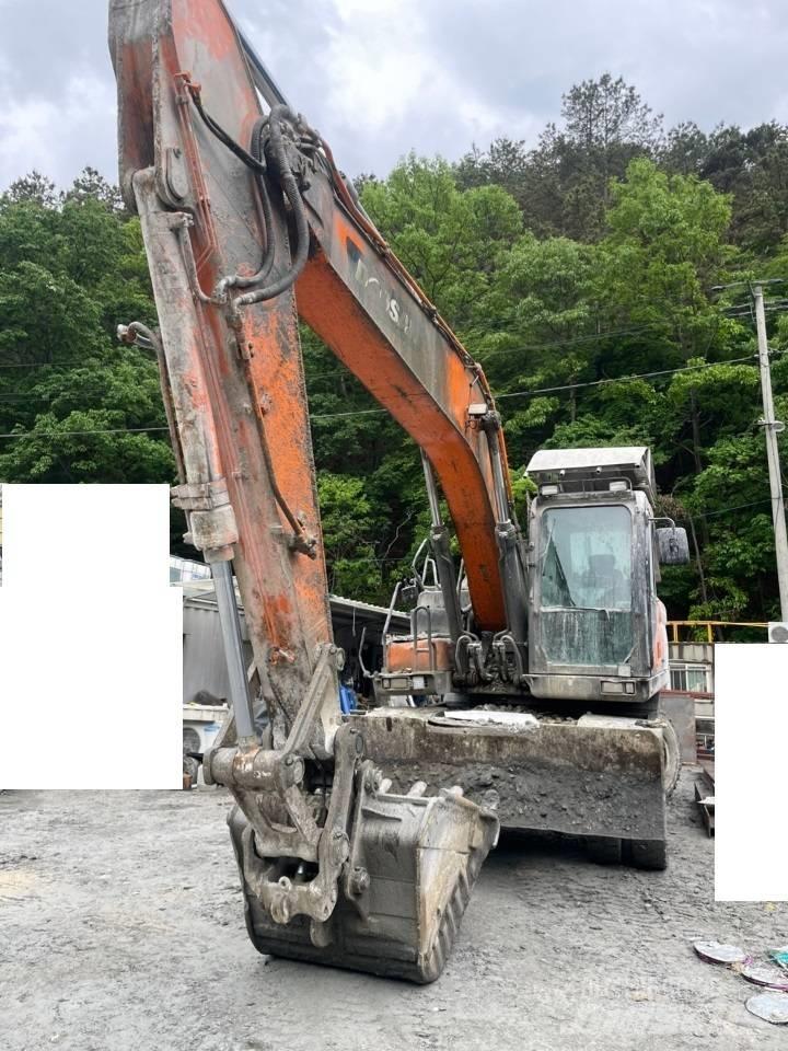 Doosan DX 210 W Колісні екскаватори