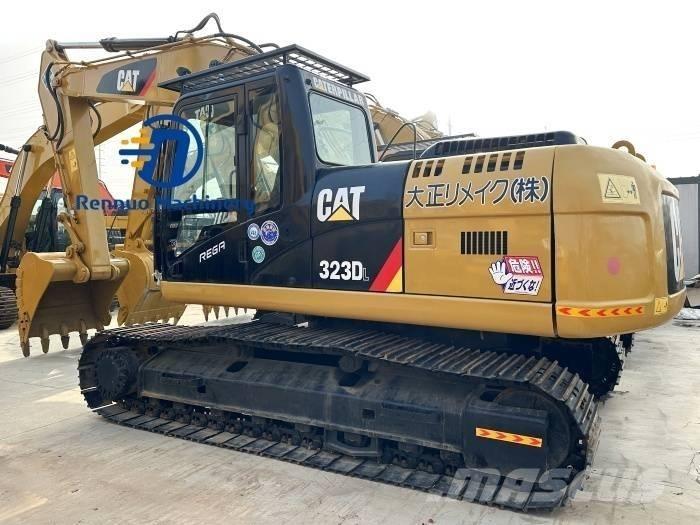 CAT 323D/323/323DL Гусеничні екскаватори