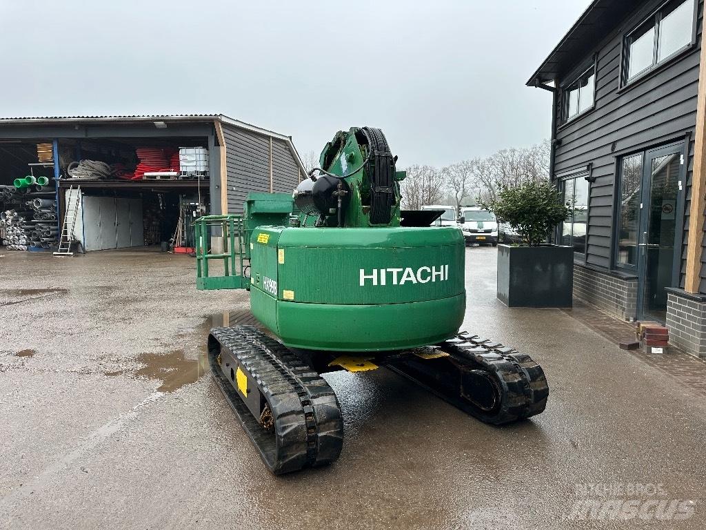 Hitachi HX 99 B Телескопічні підйомники