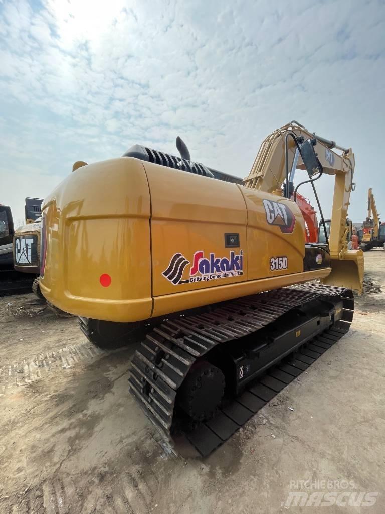 CAT 315 Гусеничні екскаватори