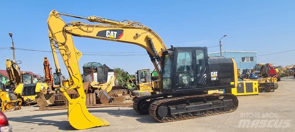 CAT 318FL Гусеничні екскаватори