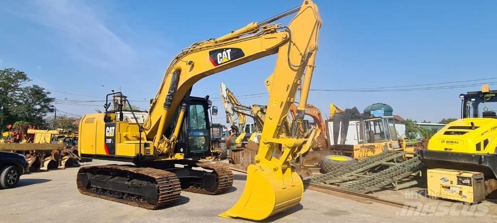 CAT 318FL Гусеничні екскаватори