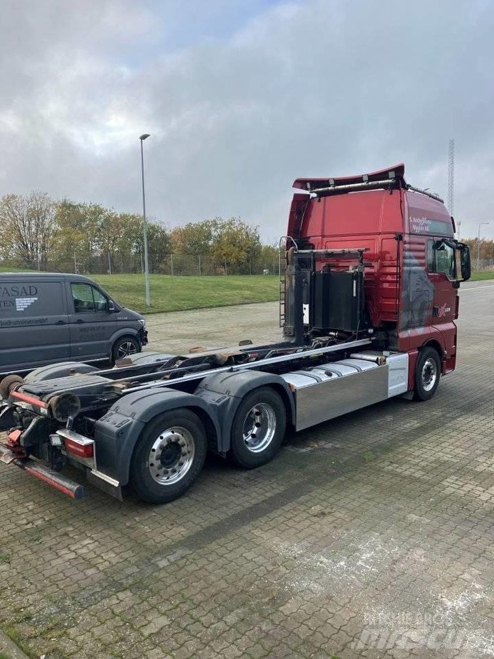 MAN TGX 26.510 Вантажівки з гаковим підйомом