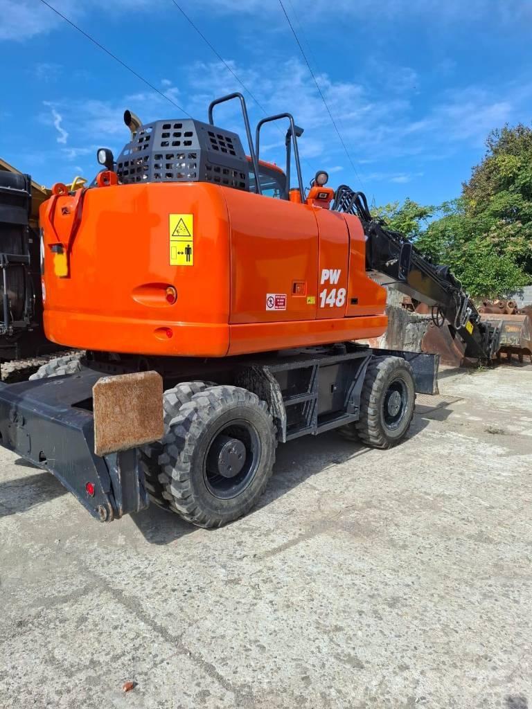 Komatsu PW 148-11 Колісні екскаватори