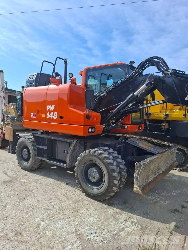 Komatsu PW 148-11 Колісні екскаватори