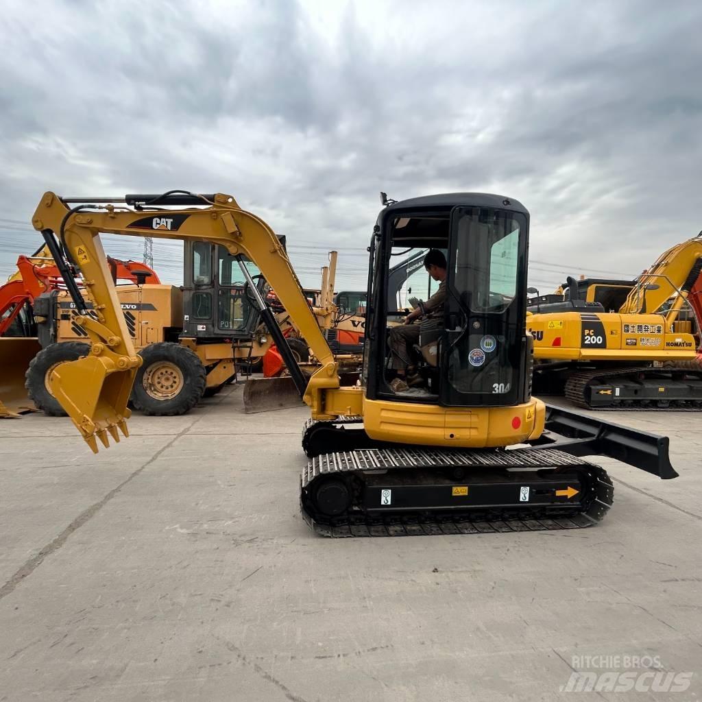 CAT 304 Гусеничні екскаватори