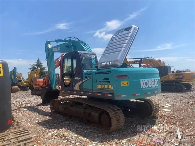Kobelco SK210D Гусеничні екскаватори