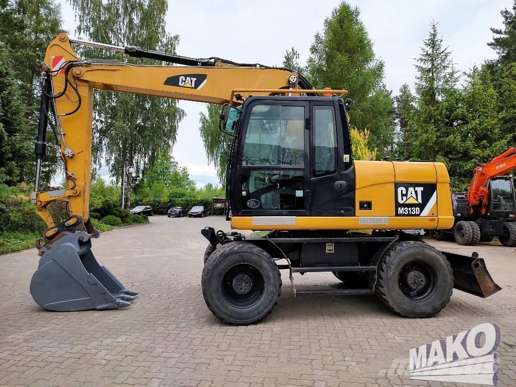 CAT M 313 D Колісні екскаватори