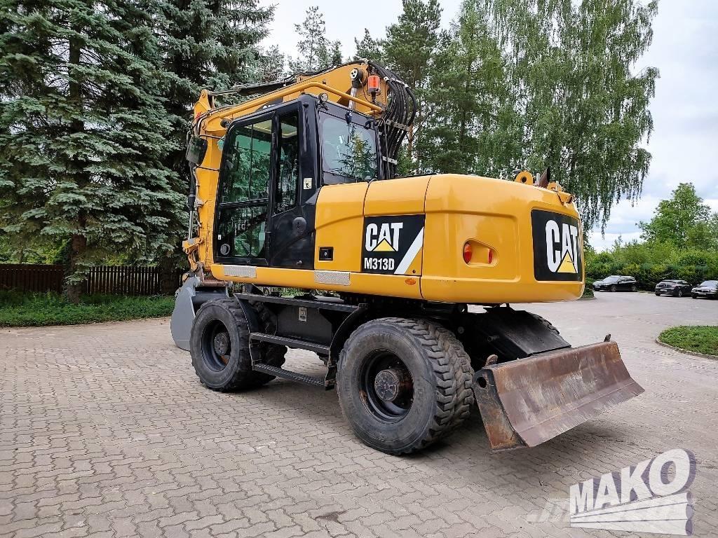CAT M 313 D Колісні екскаватори