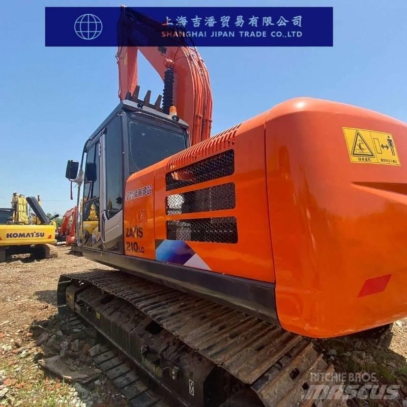 Hitachi ZX 210 Гусеничні екскаватори
