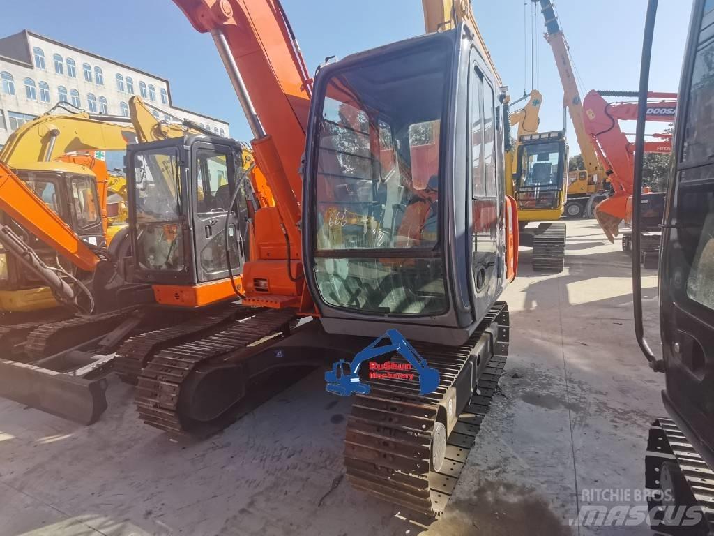 Hitachi EX60 Міні-екскаватори < 7т