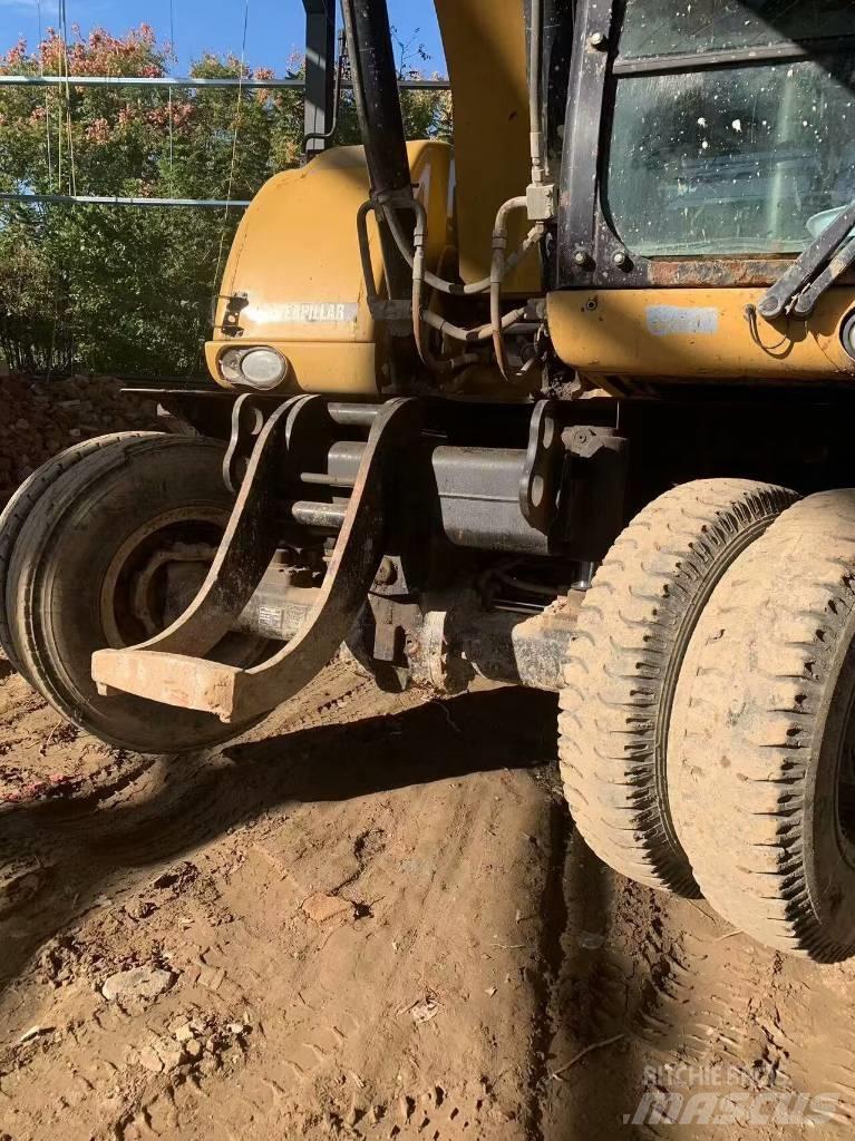 CAT 315 D Колісні екскаватори